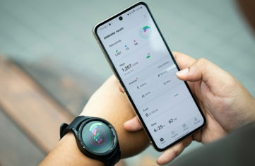 a-person-holding-a-smart-phone-in-their-hand.jpg a person holding a smart phone in their hand